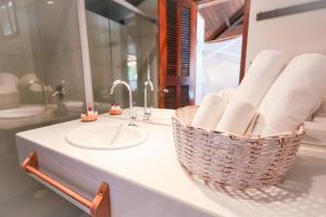 Um banheiro em Hotel Pousada Coqueiros