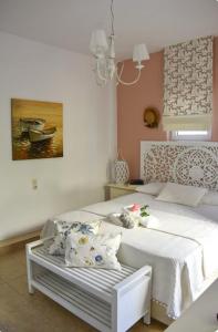 Postel nebo postele na pokoji v ubytování Myrtia - Cretan Guest House