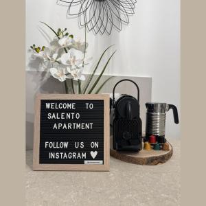 a sign that says welcome to salentoentoentoentoentoentoentoento apartment at Salento Apartment in Brindisi
