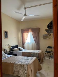 Ένα ή περισσότερα κρεβάτια σε δωμάτιο στο Hostel Del Esteko