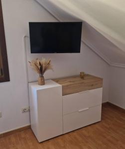 Telewizja i/lub zestaw kina domowego w obiekcie Villa San Perella