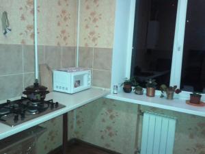 Kuchyňa alebo kuchynka v ubytovaní Yourhostel la Femme