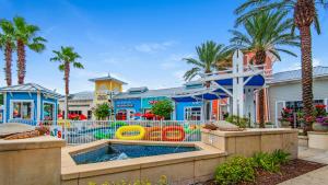an amusement park with a pool and a playground at Blue Nine 3 in Panama City Beach
