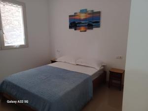 Postel nebo postele na pokoji v ubytování Casa Larinha