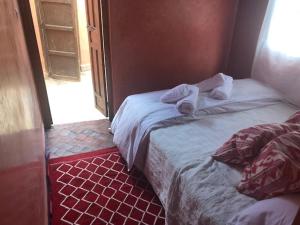 Postel nebo postele na pokoji v ubytování RIAD DES DEUX MERS
