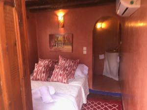 Postel nebo postele na pokoji v ubytování RIAD DES DEUX MERS
