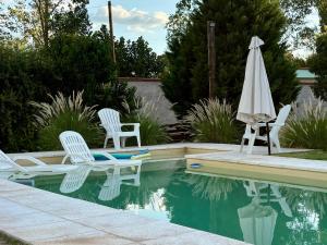 Πισίνα στο ή κοντά στο Cardozo House Monoambiente acogedor y familiar +10 φωτογραφίες