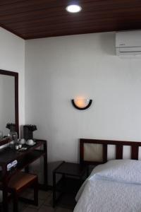 Postel nebo postele na pokoji v ubytování Hotel Maribu Caribe