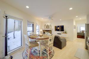 a dining room with a table and chairs and a couch at Ski, Hike & More! Couple's Getaway in Beech Mtn in Beech Mountain