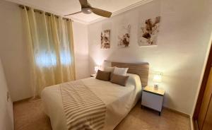 Giường trong phòng chung tại El Molino 9 Bonito Apartamento en la Ciudad