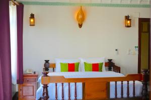 Postel nebo postele na pokoji v ubytování Hello Cambodia Boutique