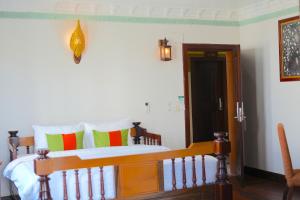 Postel nebo postele na pokoji v ubytování Hello Cambodia Boutique