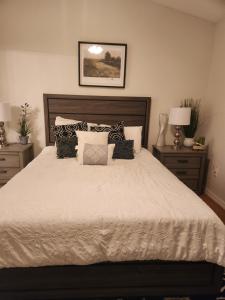 a bedroom with a large bed with pillows at D&T Flamingo Paradise in Haines City +83 photos