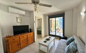 Et tv og/eller underholdning på TorreAguiló Urbanización con Piscina Gym y Padel