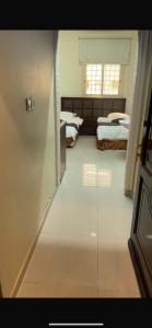 Postel nebo postele na pokoji v ubytování شقق زد السكنية