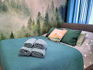 Posteľ alebo postele v izbe v ubytovaní Chillout Airport Apartment KL33 - air condition & free parking