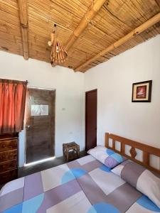 Postel nebo postele na pokoji v ubytování Casa Máncora Guesthouse