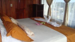 Voodi või voodid majutusasutuse Hotel Sula Sula toas