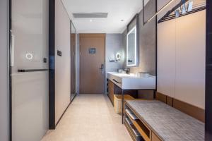 Voodi või voodid majutusasutuse Atour Hotel Wefang High Tech Zone Management Committee East Jiankang Street toas