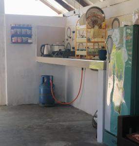 Kuchyň nebo kuchyňský kout v ubytování Amwaj Blue Cabana Arugambay
