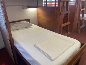 Postel nebo postele na pokoji v ubytování Voyage Guesthouse