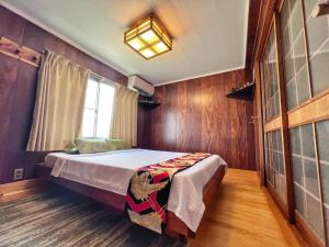 Postel nebo postele na pokoji v ubytování Bighem Maison 2