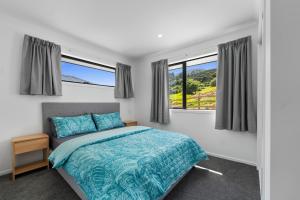מיטה או מיטות בחדר ב-Ngarimu Nook - Newly Built Self-contained Unit