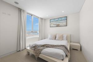 Postel nebo postele na pokoji v ubytování Joy on Jefferson