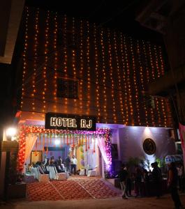 a hotel room with a sign that reads hotel rd at Hotel RJ in Patna