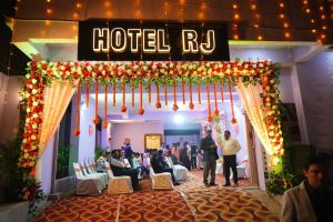 a wedding hall with a hotel ryu sign on it at Hotel RJ in Patna