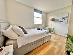 Postel nebo postele na pokoji v ubytování Stylish Corporate Pad