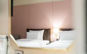 Postel nebo postele na pokoji v ubytování Incheon Browndot Hotel Nonhyeon Soraepogu
