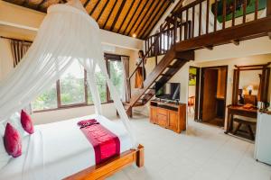 TV a/nebo společenská místnost v ubytování Sri Aksata Ubud Resort + 37 fotografií