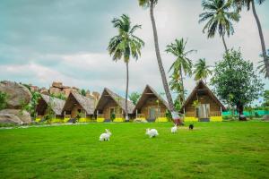 En hage utenfor Tamarind Tree Way Side Amenities