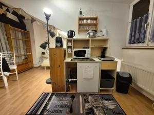 Kjøkken eller kjøkkenkrok på Chambre d'Hôtes R&S