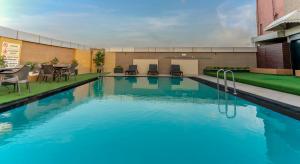Bazén v ubytování Radisson Udaipur nebo v jeho okolí