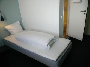 Postel nebo postele na pokoji v ubytování Motel X