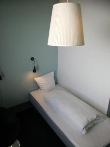 Postel nebo postele na pokoji v ubytování Motel X