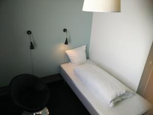 Postel nebo postele na pokoji v ubytování Motel X