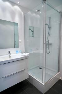Koupelna v ubytování Hotel Am Mühlenteich + 37 fotografií