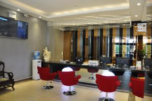 TV a/nebo společenská místnost v ubytování Juli Boutique Hotel