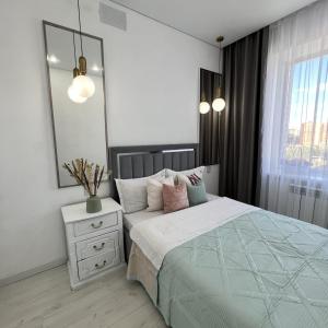 En eller flere senge i et værelse på Шахтеров 68 супер жилье