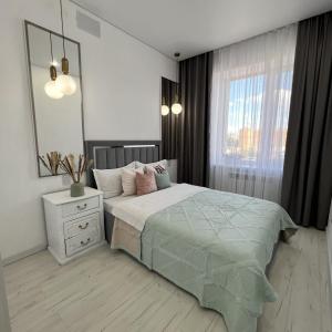 En eller flere senge i et værelse på Шахтеров 68 супер жилье