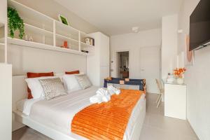 En eller flere senge i et værelse på Luxe Escape Colosseo