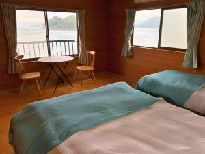 Postel nebo postele na pokoji v ubytování villa chillon
