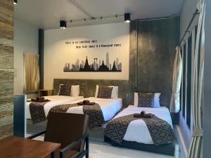 Katil atau katil-katil dalam bilik di Midtown Sukhothai