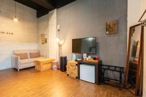 TV a/nebo společenská místnost v ubytování Ting Shuan B B&B