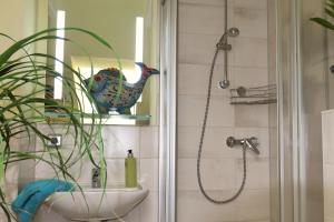 Koupelna v ubytování Auberge L'Art + 37 fotografií
