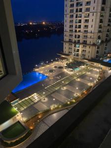 a view of a parking lot in a city at night at LeStarry Homestay in Kuching