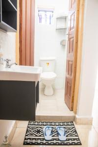TV a/nebo společenská místnost v ubytování Royal apartments Eldoret + 32 fotografií